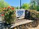 Norris Lake entrance sign with landscaping and a decorative stone border at 8562 Lake Dr, Snellville, GA 30039