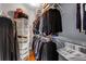 Well-organized closet features shelving, clothing racks, and storage bins, offering ample storage solutions at 1324 Cambridge Ave. Sw, Atlanta, GA 30344