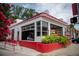 Cozy diner with red and white accents, surrounded by lush greenery at 1324 Cambridge Ave. Sw, Atlanta, GA 30344