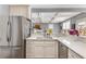 Kitchen with stainless steel appliances and countertops and coffered ceilings at 1324 Cambridge Ave. Sw, Atlanta, GA 30344