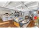 Open-concept living space with a modern kitchen, comfortable seating, and stylish decor at 1324 Cambridge Ave. Sw, Atlanta, GA 30344
