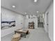 Finished basement featuring neutral colors, recessed lights, and access to the upper level kitchen at 1450 Cedarhurst Dr, Dunwoody, GA 30338