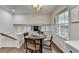 Cozy breakfast nook with wood floors, a round table, and natural light at 1450 Cedarhurst Dr, Dunwoody, GA 30338