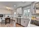 Updated kitchen featuring white cabinets, stainless steel appliances, and breakfast nook at 1450 Cedarhurst Dr, Dunwoody, GA 30338