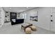 Cozy living room featuring built-in shelves, fireplace, and natural light at 1450 Cedarhurst Dr, Dunwoody, GA 30338