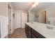 Spacious bathroom features a double sink vanity, large mirror, and a separate shower at 5111 Olive Branch Cir, Powder Springs, GA 30127