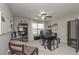 Bright bedroom featuring a ceiling fan, neutral walls, and versatile space for an office setup at 5111 Olive Branch Cir, Powder Springs, GA 30127