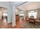 Spacious dining room with hardwood floors and access to the living room at 5111 Olive Branch Cir, Powder Springs, GA 30127