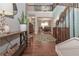 Open foyer with hardwood floors and staircase leading to the second level at 5111 Olive Branch Cir, Powder Springs, GA 30127