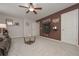 Living room with comfy sofa, television, and neutral wall color at 5111 Olive Branch Cir, Powder Springs, GA 30127