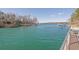 Scenic lake view from rooftop deck with metal railing at 6925 Lighthouse Point, Cumming, GA 30041