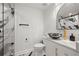 Bathroom featuring a black bowl sink, marble counters, gold hardware, glass shower with marble tile, and toilet at 1500 Tara Pl # 709, Hampton, GA 30228