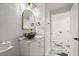 Bathroom featuring a black bowl sink, marble counters, gold hardware, and stylish light fixtures at 1500 Tara Pl # 709, Hampton, GA 30228