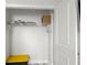 White closet with wire shelving and storage bins, providing ample space for organized storage solutions at 1500 Tara Pl # 709, Hampton, GA 30228