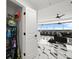 Hallway with shelving and storage space that leads into an open living room with amazing views at 1500 Tara Pl # 709, Hampton, GA 30228