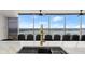 The kitchen features a stunning countertop, modern sink, and expansive windows offering great outdoor views at 1500 Tara Pl # 709, Hampton, GA 30228