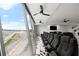 Spacious recreation room with row seating, racetrack views, ceiling fans, and entertainment setup at 1500 Tara Pl # 709, Hampton, GA 30228