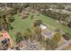 Expansive aerial view of a sprawling property with lush greenery and a detached building at 300 Smith Ave, Bowdon, GA 30108