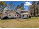 Backyard with chain link fence and sunroom at 300 Smith Ave, Bowdon, GA 30108