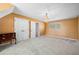 Bedroom with carpet, closet, window, dresser, and chandelier at 300 Smith Ave, Bowdon, GA 30108