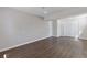 Spacious basement featuring laminate flooring and a large closet at 6414 Bimini Dr, Forest Park, GA 30297