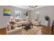Cozy living room with plush seating, decorative rug, and ample natural light creating a relaxing atmosphere at 6414 Bimini Dr, Forest Park, GA 30297