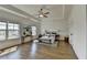 Spacious main bedroom boasts tray ceilings, hardwood floors and abundant natural light from large windows at 717 Farmstead Rd, Suwanee, GA 30024