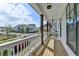 Covered porch showing stylish lantern lighting and neighborhood views at 717 Farmstead Rd, Suwanee, GA 30024