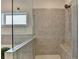 This shower features a glass enclosure and tiled walls at 717 Farmstead Rd, Suwanee, GA 30024