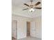 Bedroom with a ceiling fan, and two closets at 164 Edison Dr, Stockbridge, GA 30281