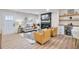 Bright and airy living room featuring a fireplace, built-in bar, and stylish decor at 2243 Newnan St, Atlanta, GA 30344