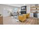 Bright living room with modern fireplace, built-in bar, and stylish furniture at 2243 Newnan St, Atlanta, GA 30344