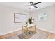 Office space featuring a modern gold desk, neutral colors, and natural light at 2243 Newnan St, Atlanta, GA 30344