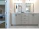 Elegant bathroom vanity with dual sinks, framed mirrors, and sleek cabinets for a spa-like experience at 532 Pearl St, Cumming, GA 30040