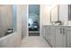 Bright bathroom features a modern shower and cabinetry, offering style and functionality at 532 Pearl St, Cumming, GA 30040