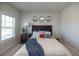 Cozy bedroom featuring decorative mirrors, a neutral palette, and soft natural light creating a calming atmosphere at 532 Pearl St, Cumming, GA 30040