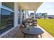 Relaxing outdoor living space with a covered patio and beautiful yard at 532 Pearl St, Cumming, GA 30040