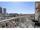 Enjoy city views from this balcony with iron railing and outdoor seating at 860 Peachtree Ne St # 2212, Atlanta, GA 30308