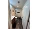 Bathroom featuring patterned tile floor and white tiled shower with glass door at 860 Peachtree Ne St # 2212, Atlanta, GA 30308