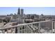 Stunning city views from a high-rise balcony with iron railing at 860 Peachtree Ne St # 2212, Atlanta, GA 30308