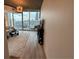 Inviting living room with hardwood floors, city views, and comfortable furnishings at 860 Peachtree Ne St # 2212, Atlanta, GA 30308