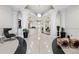 Elegant lobby area with sleek terrazzo flooring, decorative columns, and modern furniture at 860 Peachtree Ne St # 2212, Atlanta, GA 30308