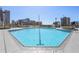 Stunning rooftop pool with clear blue water and panoramic city views, ideal for relaxation and recreation at 860 Peachtree Ne St # 2212, Atlanta, GA 30308