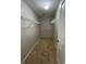 Walk-in closet with wire shelving and carpet flooring at 10918 Gallier St, Alpharetta, GA 30022