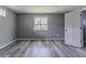Bedroom featuring gray walls and vinyl plank flooring at 1831 Jonesboro Se Rd, Atlanta, GA 30315