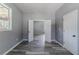 Bedroom with a neutral color scheme, wood flooring, and ample natural light at 1831 Jonesboro Se Rd, Atlanta, GA 30315