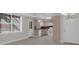 Inviting eat-in kitchen with window and white appliances at 5280 Oak Hill Ter, Cumming, GA 30040