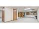 Finished basement offering versatile space with multiple doors and ample lighting at 730 Ponderosa Ct, Fayetteville, GA 30214