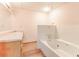 Bathroom featuring a jacuzzi tub and single vanity at 730 Ponderosa Ct, Fayetteville, GA 30214