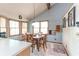 Cozy dining area with many windows that bring in sunlight and tile floors at 730 Ponderosa Ct, Fayetteville, GA 30214